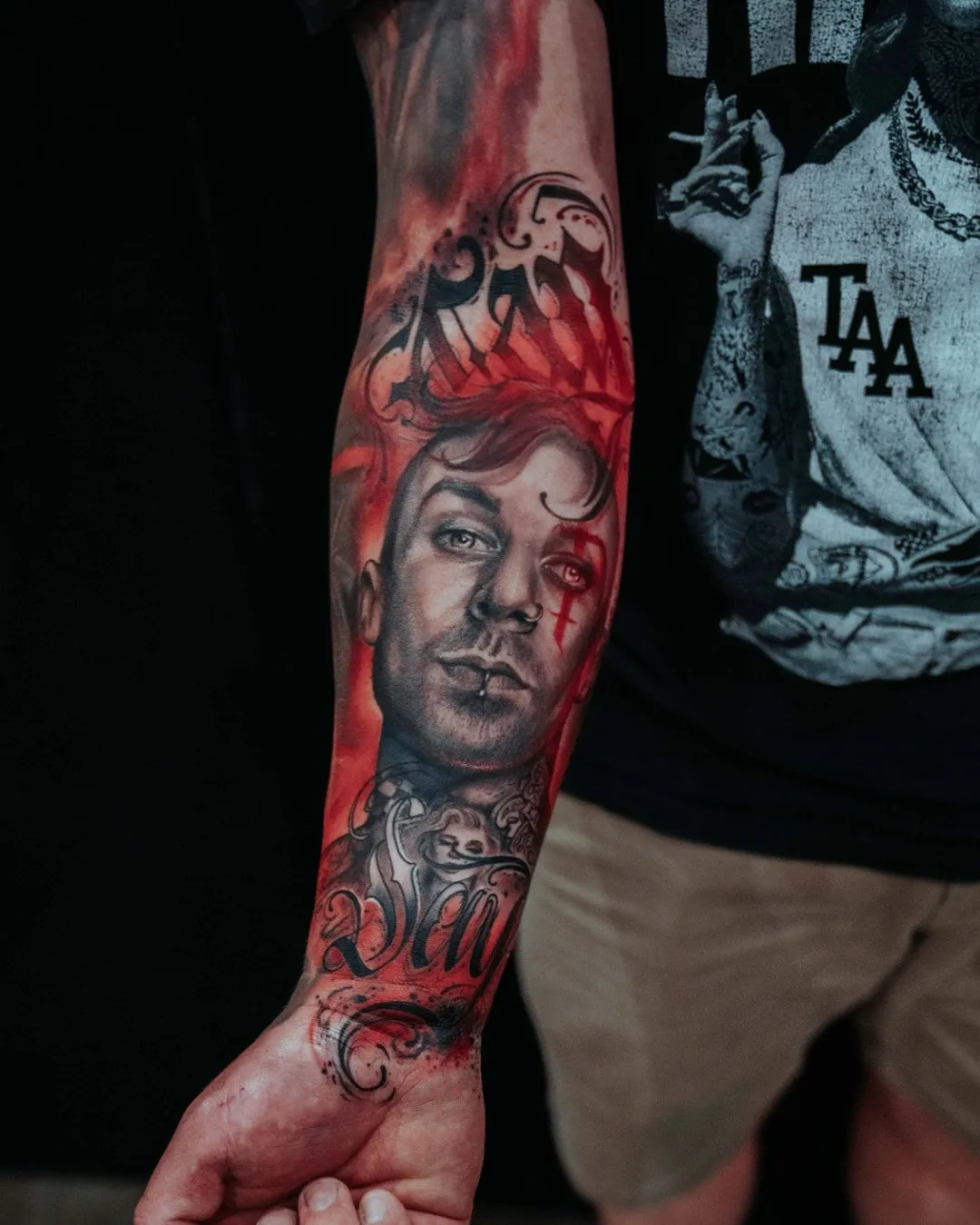 Large portrait tattoo in progress on a client’s arm at the Australian Tattoo Expo
