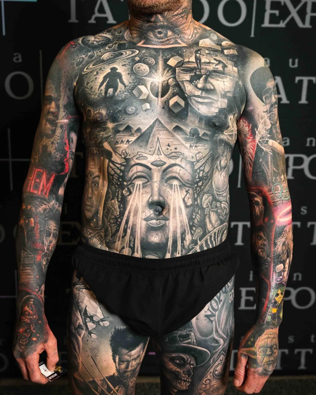 Tattooed attendee displaying a full torso black and grey tattoo at the Australian Tattoo Expo