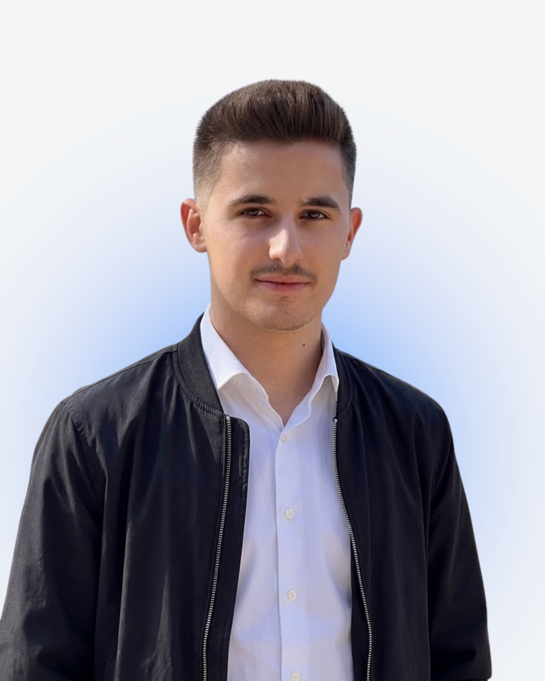 A camera man filming in the mountains with a gimbel and a smartphone.