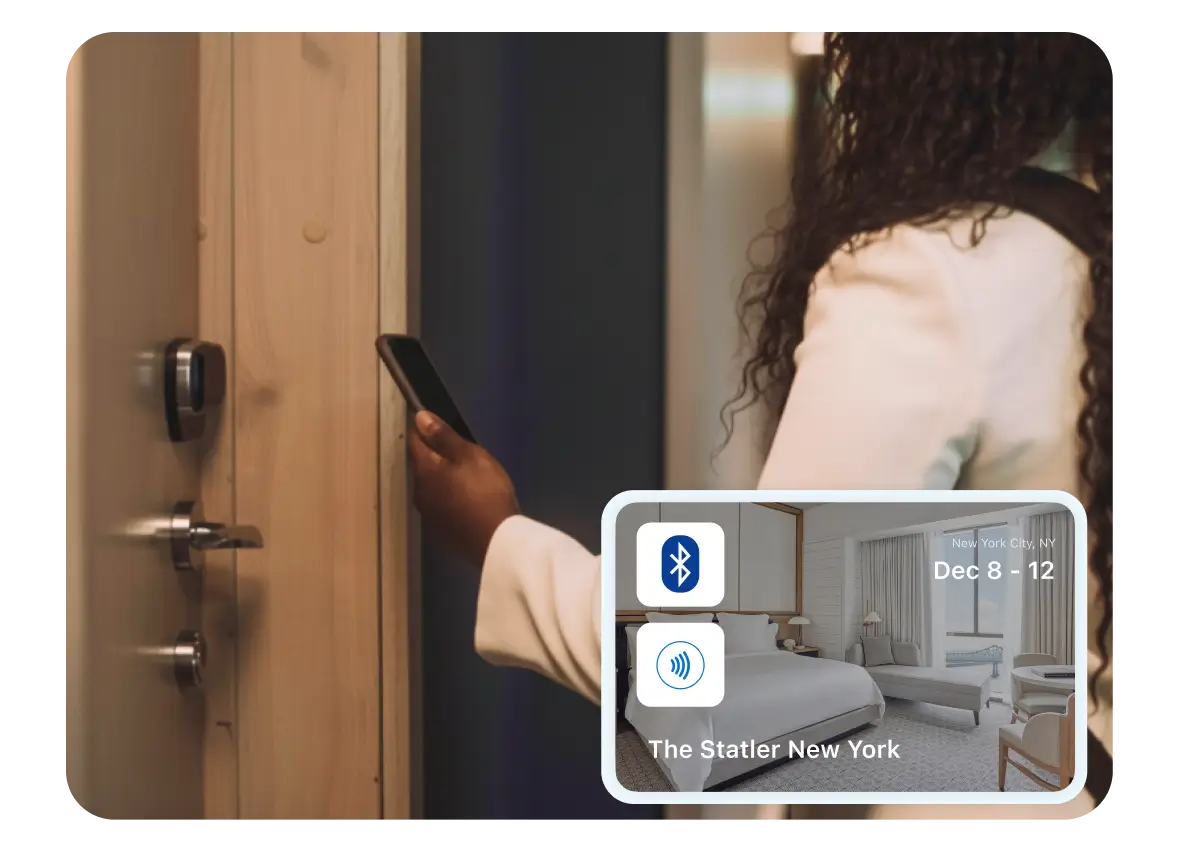 woman entering hotel with smartphone key