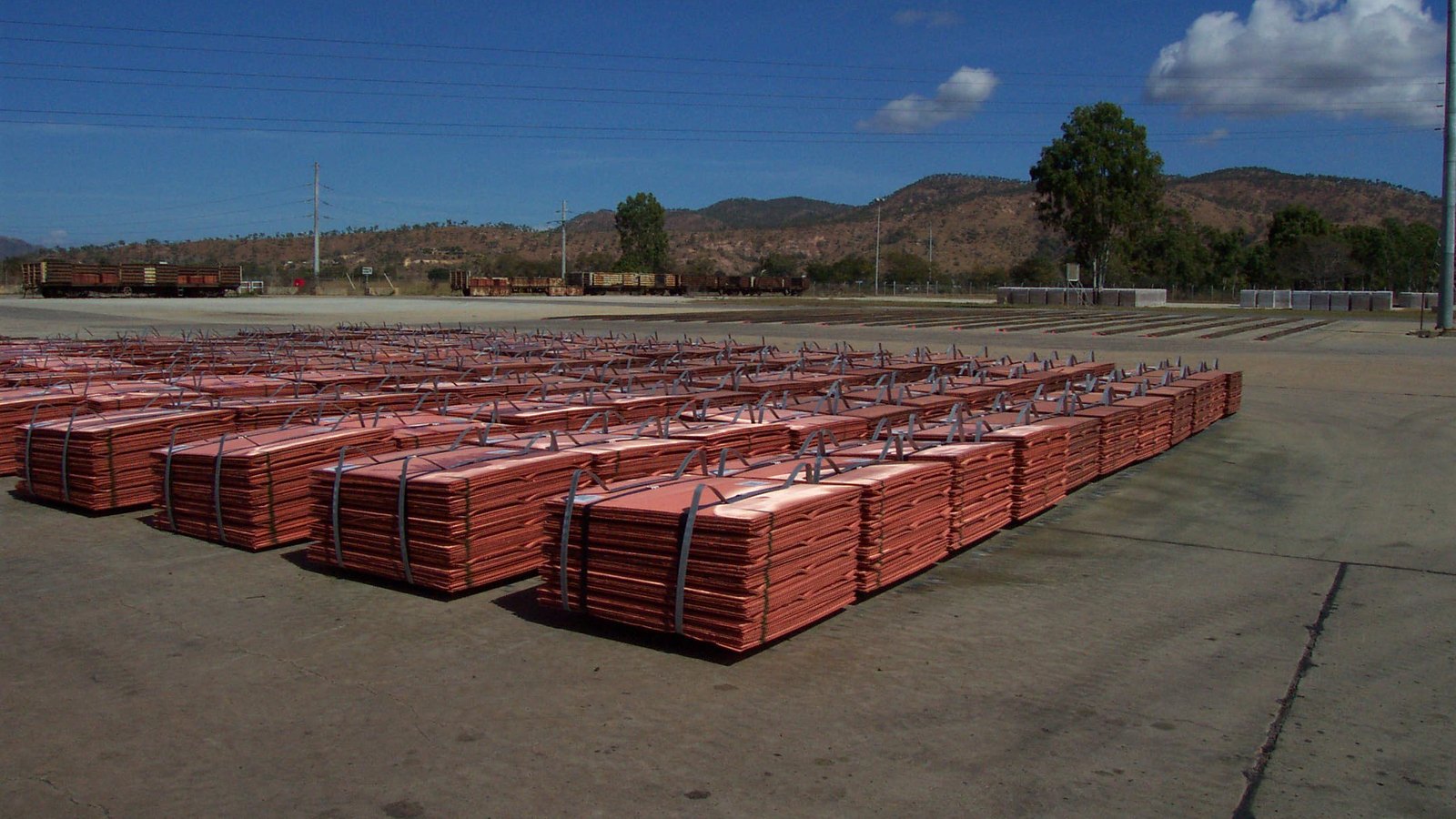 Bundles of copper cathodes at a refinery