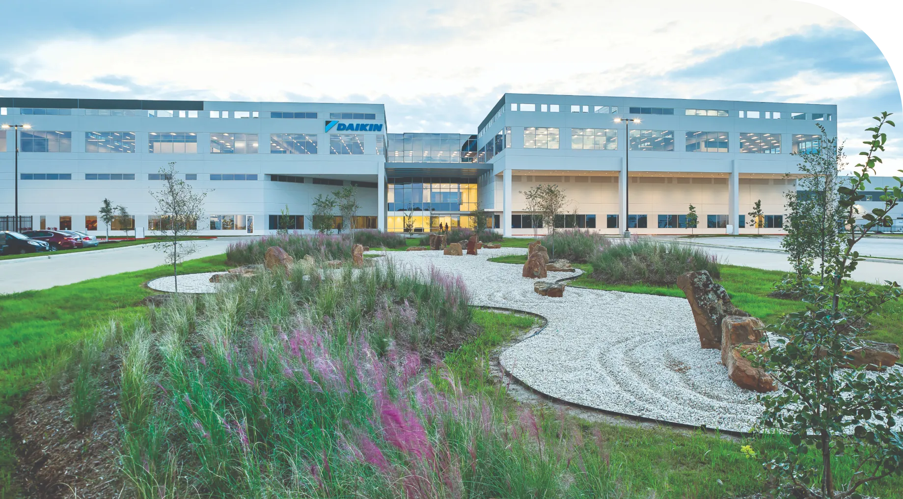Daikin corporate headquarters with modern building and zen-like landscaped garden