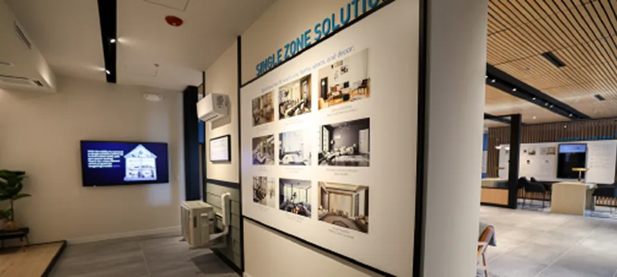 Modern showroom with interior design photos and display screens