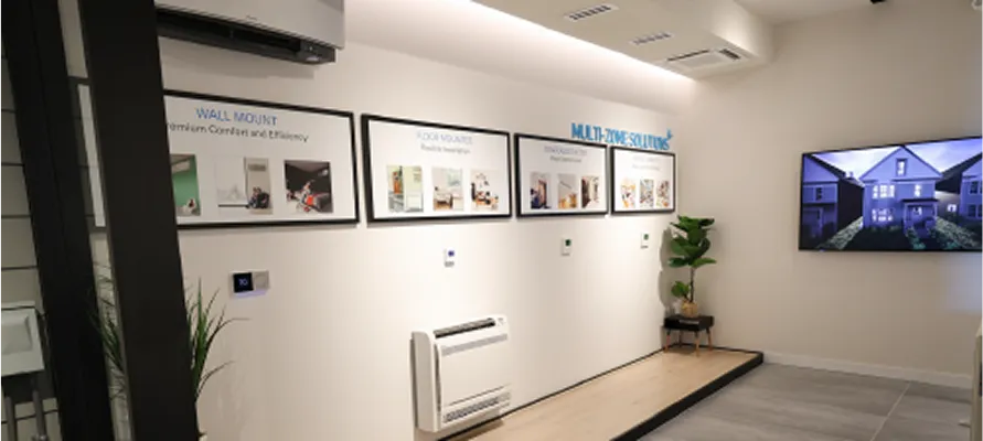 Modern showroom with wall-mounted displays and mini-split air conditioning units