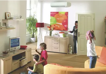 Family relaxing in a bright, modern living room with colorful artwork
