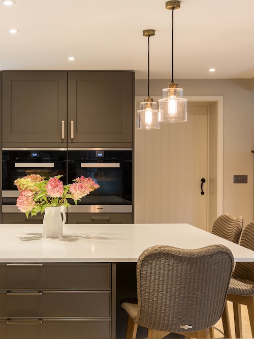 A modern looking kitchen with a large counter top