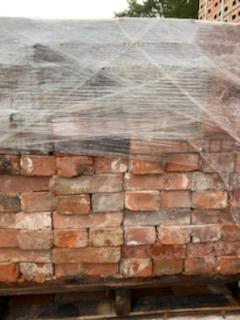 Reclaimed brick wall in mixed reds