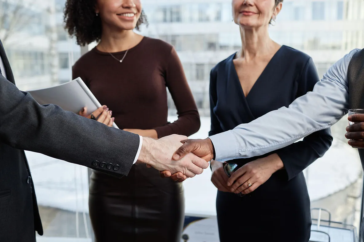 business-people-shaking-hands-partnerships-effective-strategies-for-scaling-tutoring-services-across-different-regions-edge-tutor