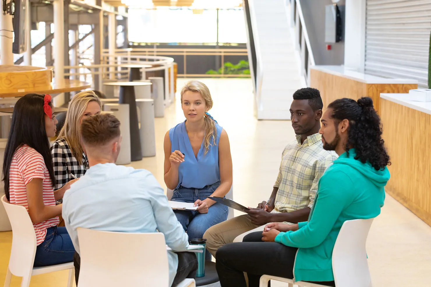 business-people-sitting-together-having-a-group-discussion-how-group-discussion-can-sharpen-your-english-speaking-skills-edge-tutor