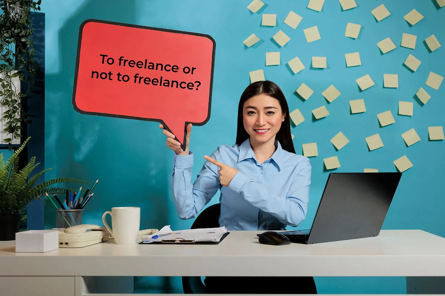 An asian woman in a home office with post-its on the background deciding whether to freelance or not