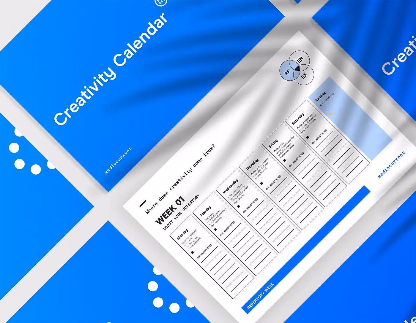 Mockup of Creativity Calendar cover and week one page.