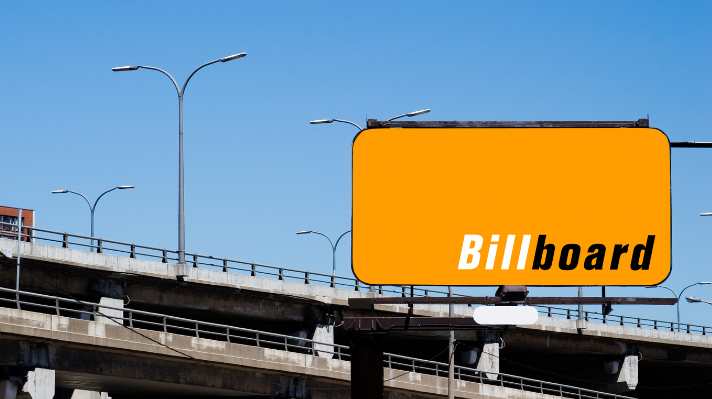 Billboard on a busy highway