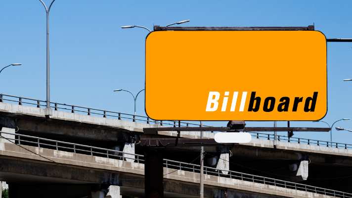 Billboard on a busy highway