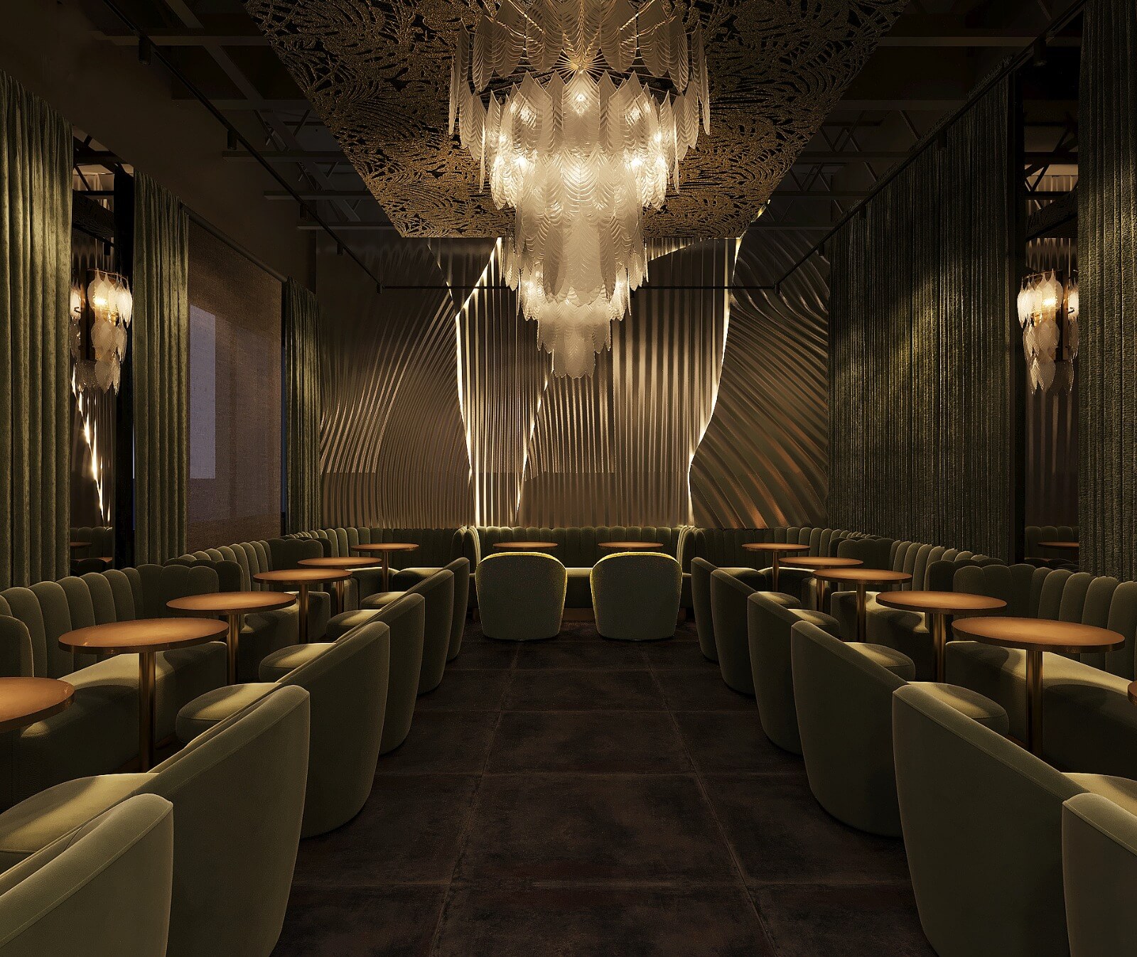 Elegant dimly lit lounge with green velvet chairs, round tables, and a large ornate chandelier.