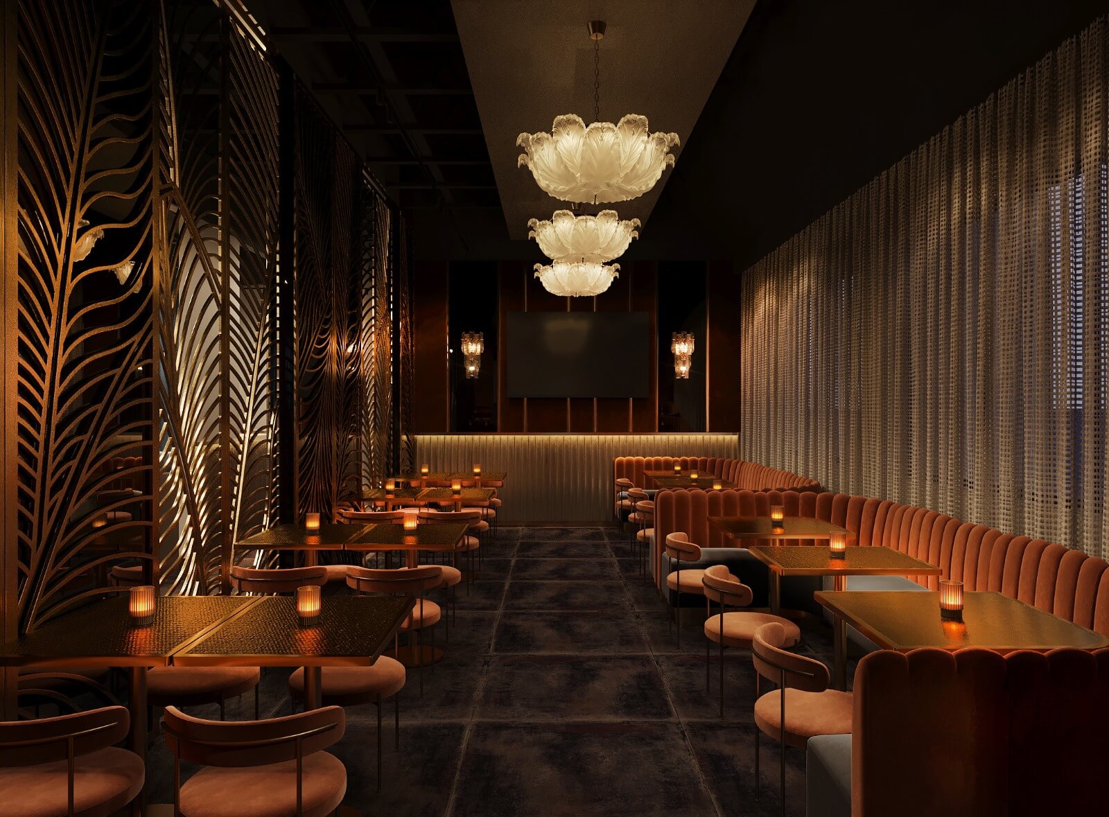 Dimly lit upscale dining area with velvet chairs, ornate divider, pendant lights, and small candles on tables.