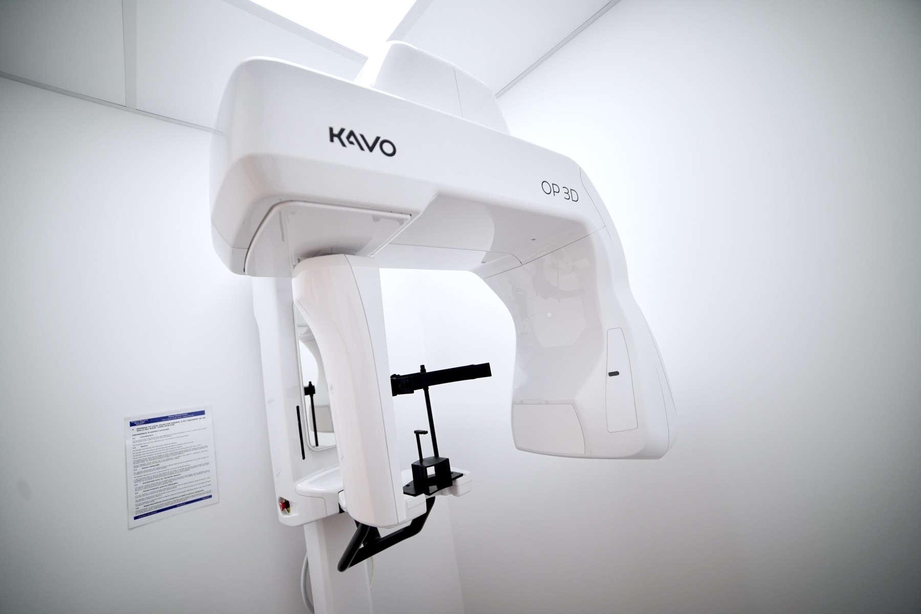 KaVo OP 3D dental imaging machine in a white room.