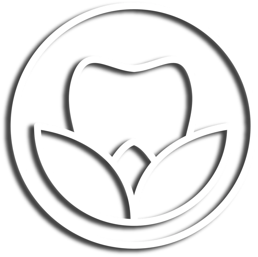 White line art icon of a tooth above two leaves enclosed in a circle on a black background, symbolizing dental care or oral health with a natural or eco-friendly theme.