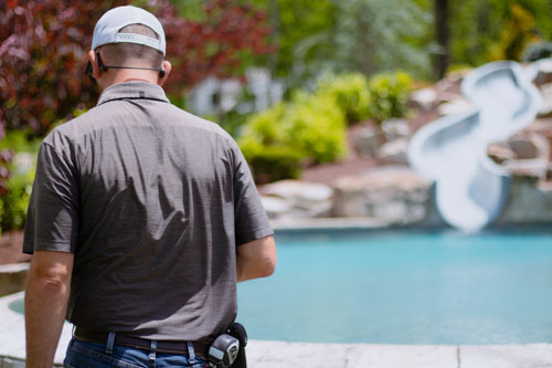 Pool Inspector looking down at pool