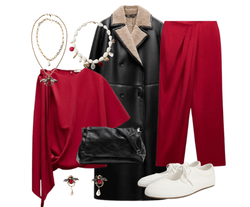 blusa drapeada vermelha, calça de alfaiataria vermelha, casaco preto com gola shearling, sapatos brancos casuais, colar de pérolas multicoloridas, brincos decorados, bolsa clutch em couro preto