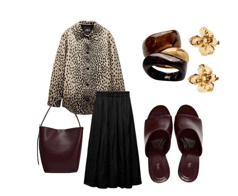 camisa animal print marrom claro, saia midi preta plissada, mules de couro bordô, bolsa tote estruturada bordô, brincos dourados florais, braceletes em resina marrom e dourado
