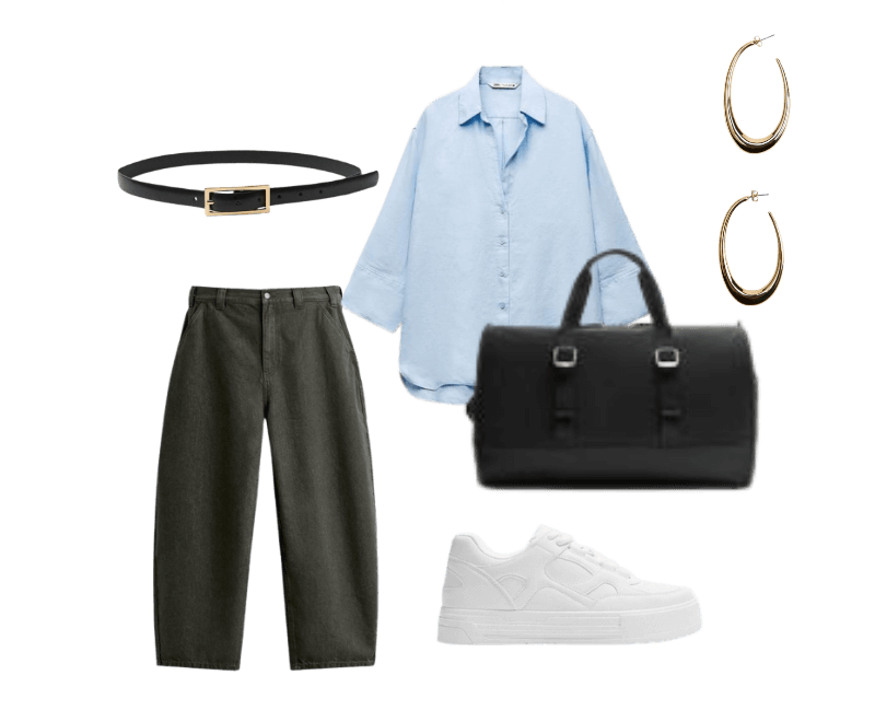 camisa azul clara oversized, calça de alfaiataria cinza escuro, tênis branco, cinto preto com fivela dourada, bolsa carteiro em couro preto, argolas douradas