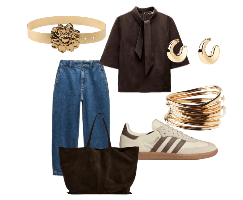 Blusa marrom de manga curta com laço no pescoço, calça jeans de corte reto azul índigo, tênis branco com detalhes marrons, brincos de argola dourados, pulseiras delicadas douradas, cinto bege com fivela floral, bolsa tote em camurça marrom