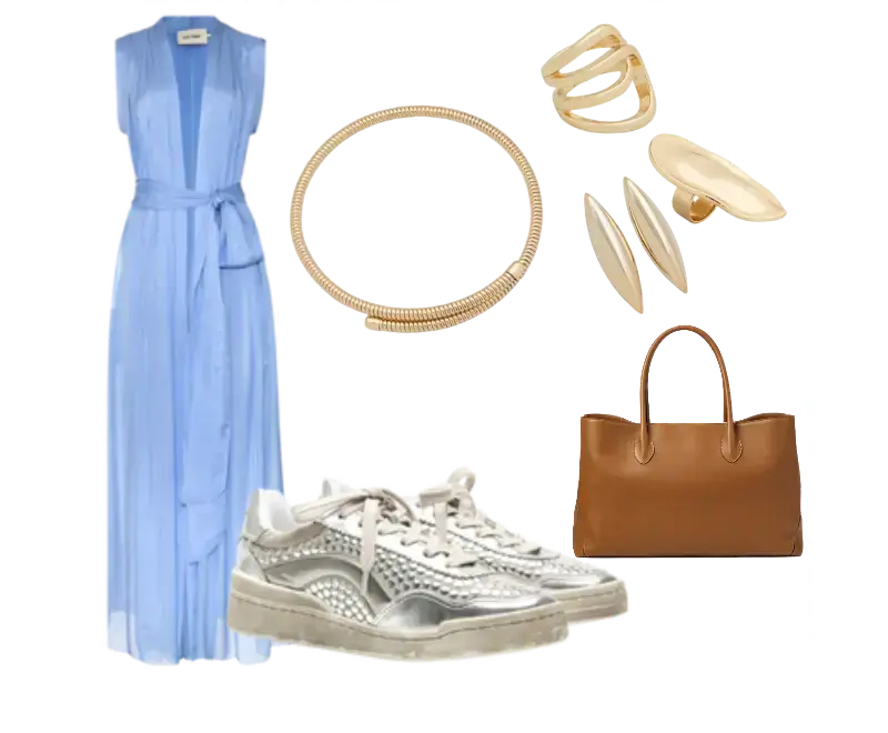 vestido longo de seda azul com cinto, tênis brancos com detalhes metálicos prateados, bolsa tote estruturada em couro marrom, colar dourado minimalista, conjunto de anéis e brincos