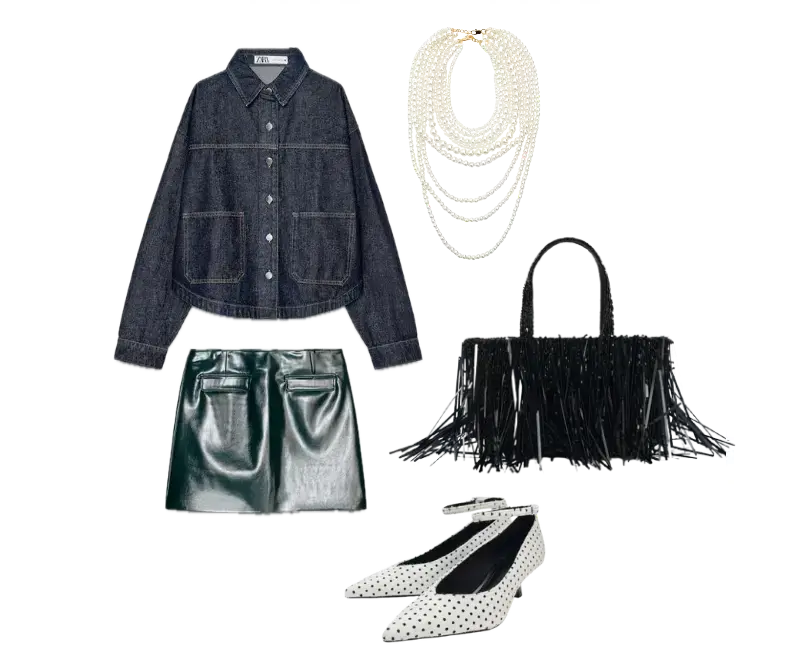 jaqueta jeans azul escuro, saia de couro sintético preta, sapato de salto médio com estampa de poá, bolsa com franjas pretas, colar de pérolas em camadas