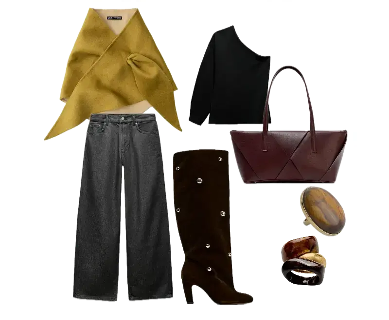 suéter assimétrico preto, cachecol de lã amarelo mostarda, calças jeans de corte reto preto desbotado, botas de cano alto em camurça marrom, bolsa de couro estruturada vinho, acessórios robustos tons terrosos