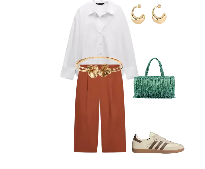 camisa social branca em algodão, calça culote terracota de alfaiataria, tênis de couro bege com listras marrons, bolsa de mão verde com franjas, brincos de argola dourados, cinto decorativo dourado