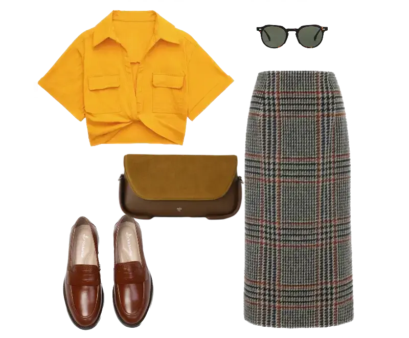 camisa cropped amarela, saia lápis midi xadrez, loafers de couro marrom, bolsa crossbody de camurça marrom, óculos de sol de armação preta