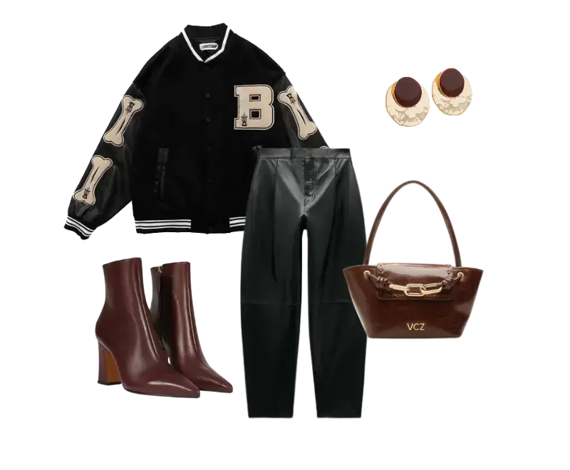 jaqueta varsity preta, calça preta de couro, ankle boots em couro marrom, bolsa média em couro marrom, brincos de argola média em ouro com detalhes em marrom