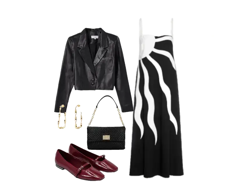 jaqueta cropped preta em couro ecológico, vestido longo preto e branco, loafers de verniz bordô, bolsa de ombro preta em tecido texturizado com fecho dourado, brincos dourados