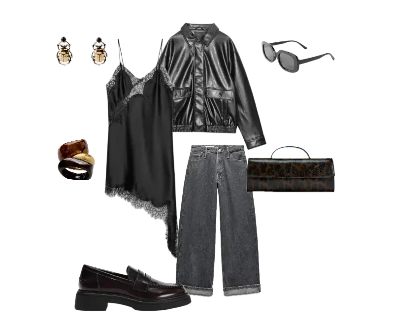slip dress preto em cetim, jaqueta cropped de couro preta, jeans de lavagem escura com corte reto, loafers de couro marrom, óculos de sol com armação arredondada, clutch animal print, brincos dourados, pulseiras de resina
