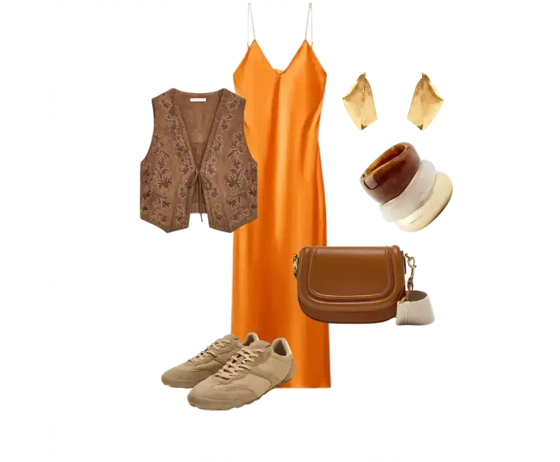 vestido slip dress cetim laranja, colete vintage bordado, tênis bege, bolsa tiracolo couro caramelo, brincos dourados geométricos, braceletes de resina