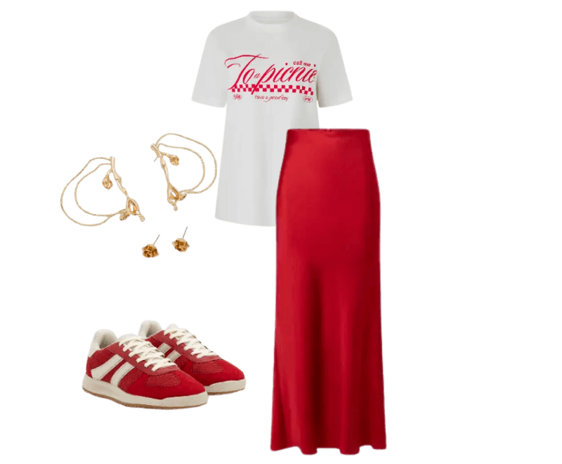 camiseta branca estampada, saia longa vermelha, tênis esportivos vermelhos, brincos dourados, pulseiras douradas.