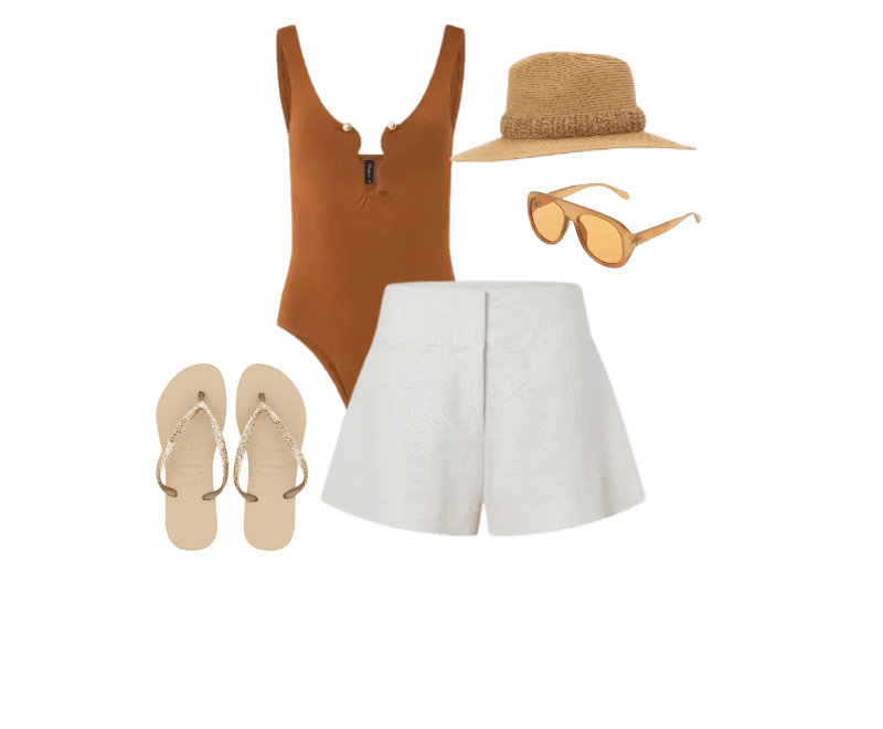 maiô terracota, shorts brancos, chapéu de palha, óculos de sol marrom, sandálias bege