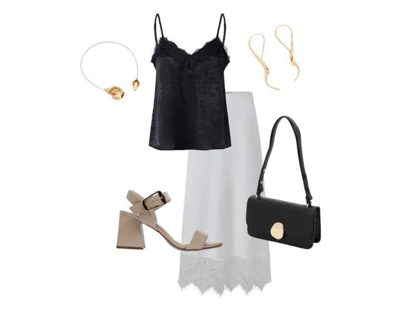 blusa preta, saia longa branca, sandálias bege, bolsa preta, acessórios dourados.