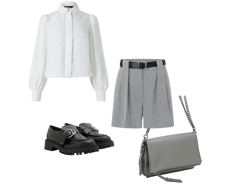 Short Curto em Alfaiataria com Cinto Ajustável em PU Cinza ; Carteira Envelope Grande com Alças de Corrente Cinza ; Sapato Mocassim Tratorado em PU com Maxi Fivela Preto ; Camisa em Crepe com Botão Diferenciado e Manga Bufante