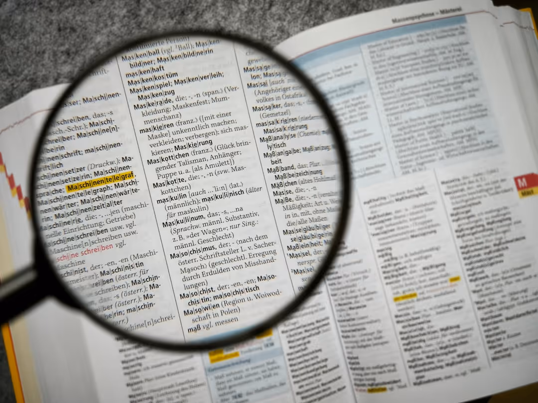 A document with a magnifying glass over the terms and conditions, highlighting the importance of understanding loan details - bridge loan rates