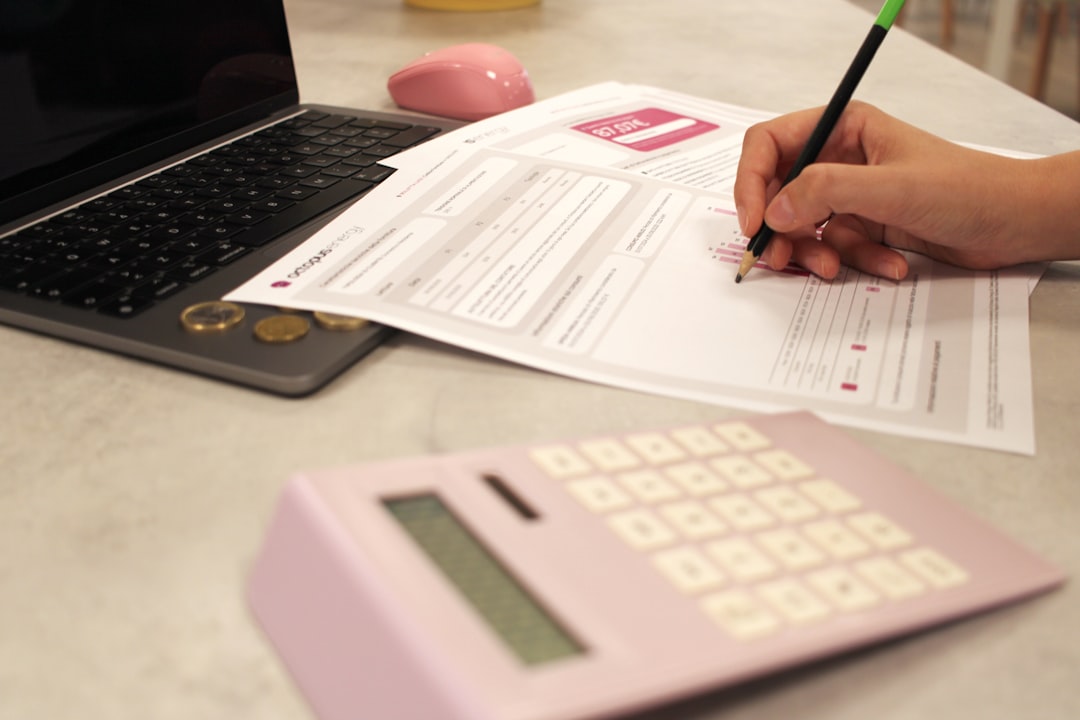 A person is reviewing a loan document with a calculator, symbolizing financial considerations and due diligence - flexible bridge loans