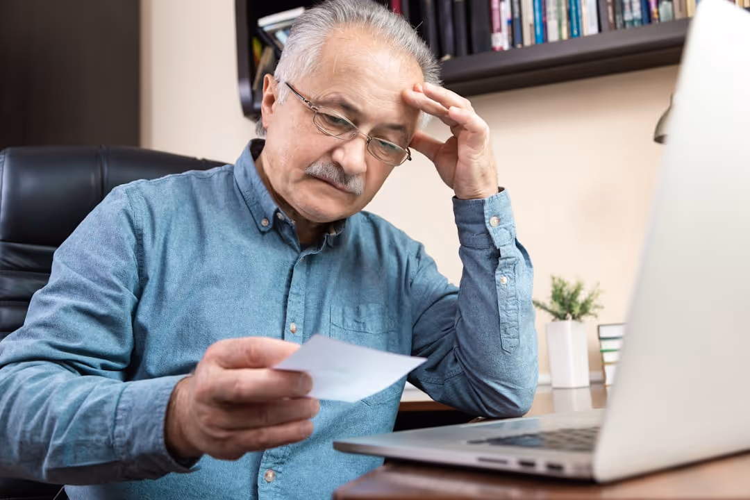 person reviewing loan document - refinance bridge loan