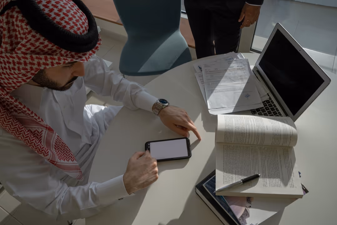 person reviewing a loan application on a tablet - direct bridge lenders
