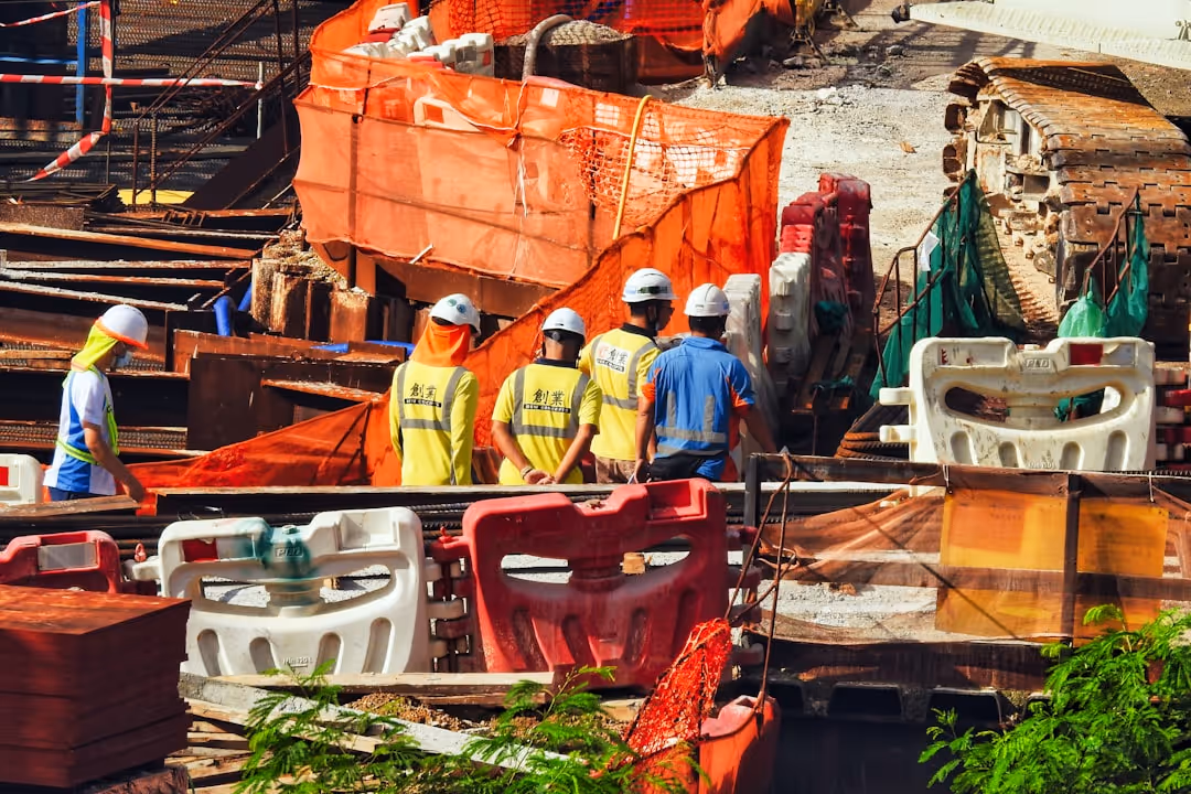 Construction site with workers - fix and flip property lenders
