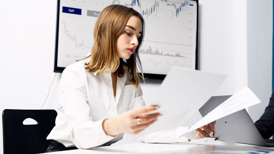 real estate investor analyzing property data on a laptop - quick turn real estate