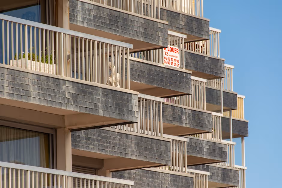 For Rent sign on a modern NYC apartment building - NYC investment property