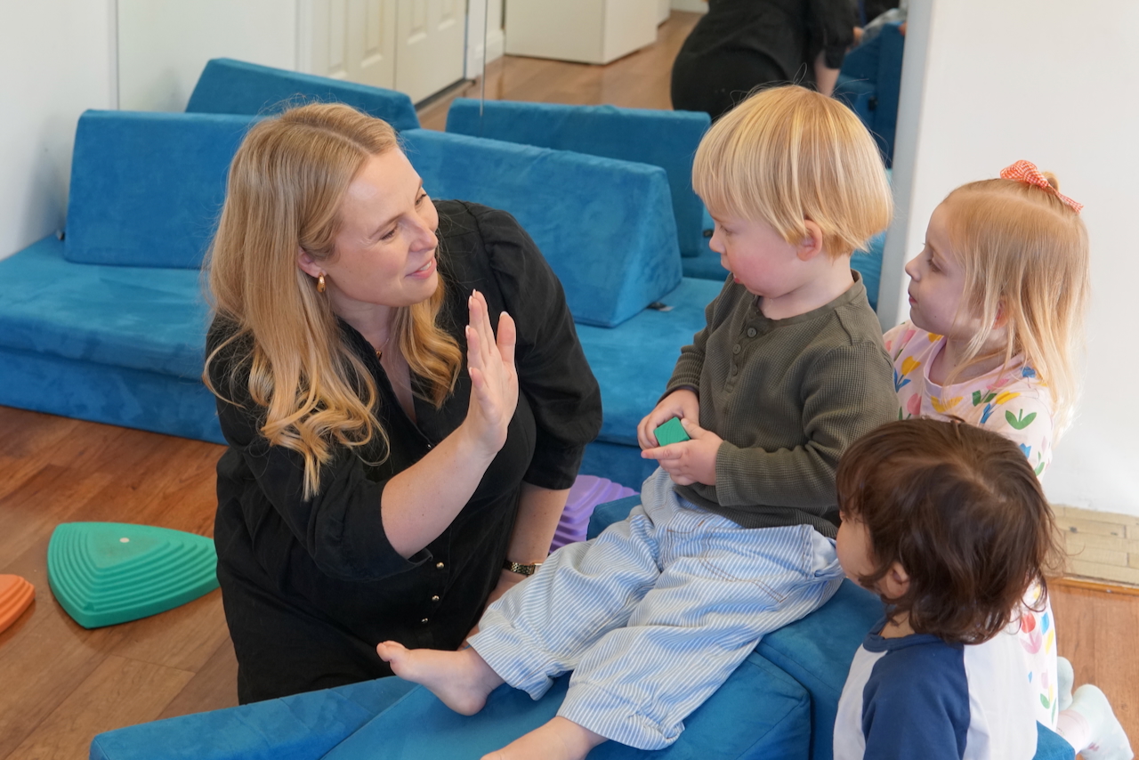 A therapist playing with children
