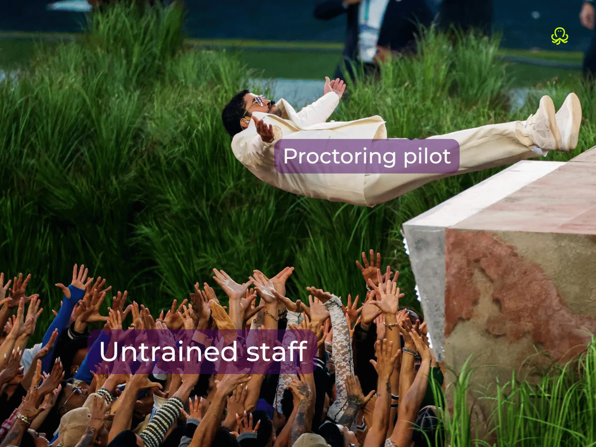 Photo of Bad Bunny crowd-surfing above raised hands during Super Bowl, labeled with two purple text boxes: “Proctoring pilot” on the performer and “Untrained staff” on the crowd below. The joke suggests a pilot launch being thrown into the air without proper support, preparation, or control.