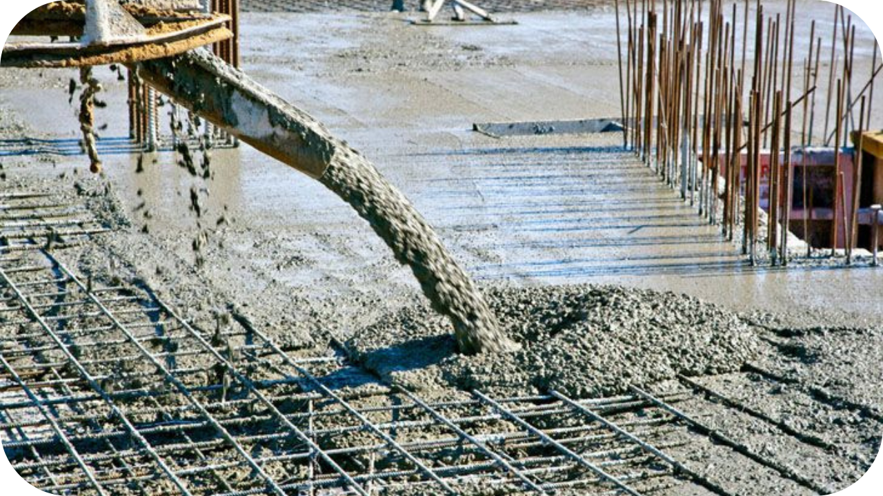 Fresh eco-friendly concrete Melbourne mix being poured over steel reinforcement, forming a strong and sustainable base for future construction projects.