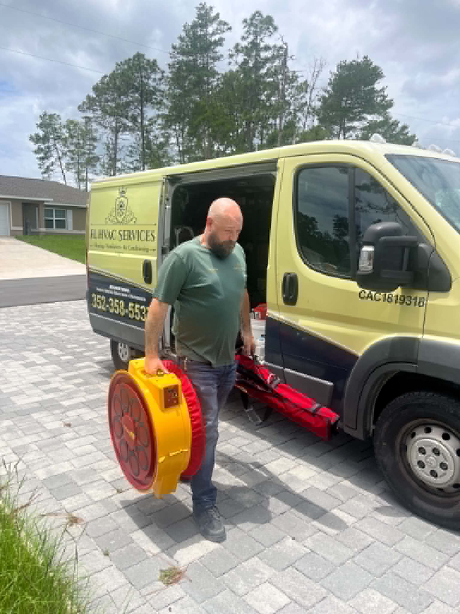 FL HVAC Services branded service van ready to perform AC performance tune-ups in Ocala and The Villages, FL